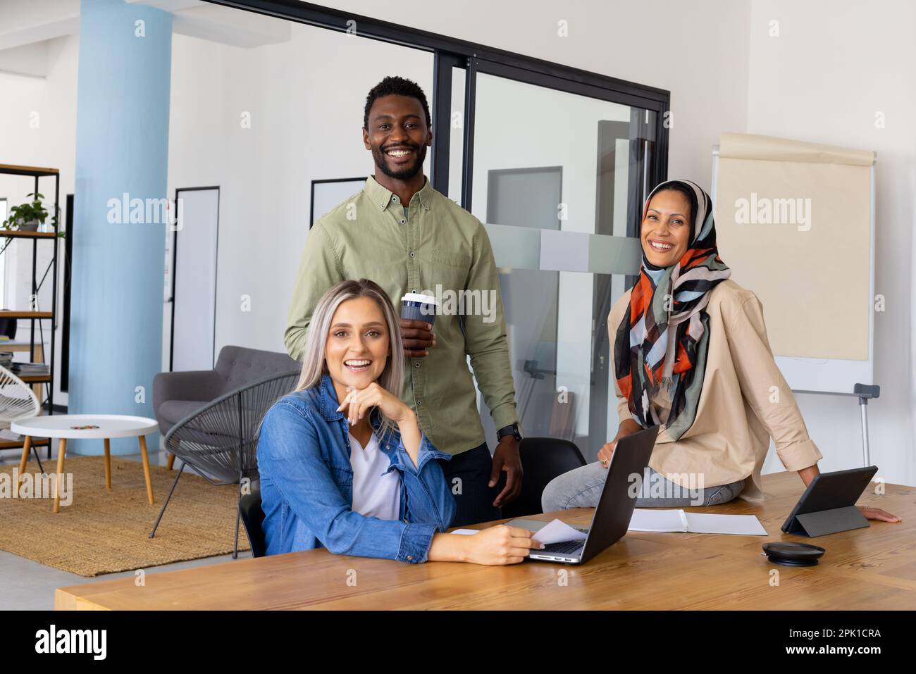 Portrait of happy casual diverse business people working in modern office  Stock Photo - Alamy, image size:1300x957