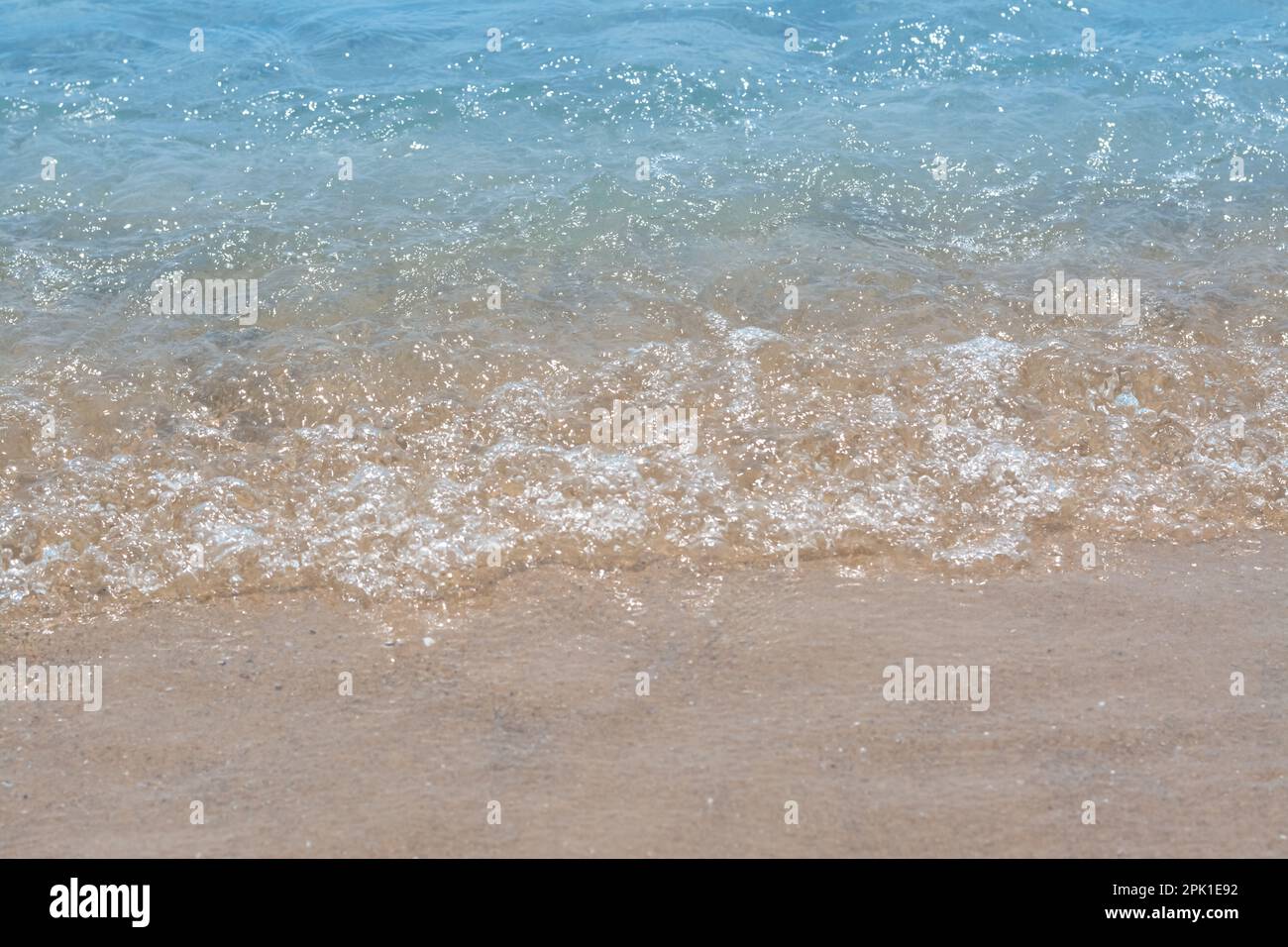 Sea wave on sandy hi-res stock photography and images - Alamy