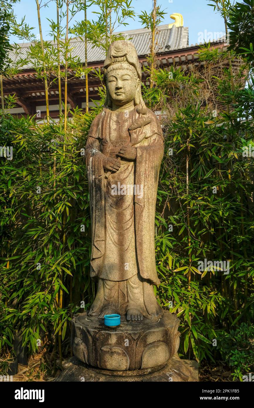 Tokyo, Japan - March 9, 2023: Statue of Kannon at Zojoji Temple is a Buddhist temple in Minato, Tokyo, Japan. Stock Photo