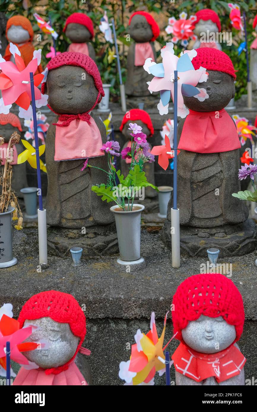 Tokyo, Japan - March 9, 2023: Jizo statues at Zojoji Temple is a Buddhist temple in Minato, Tokyo, Japan. Stock Photo