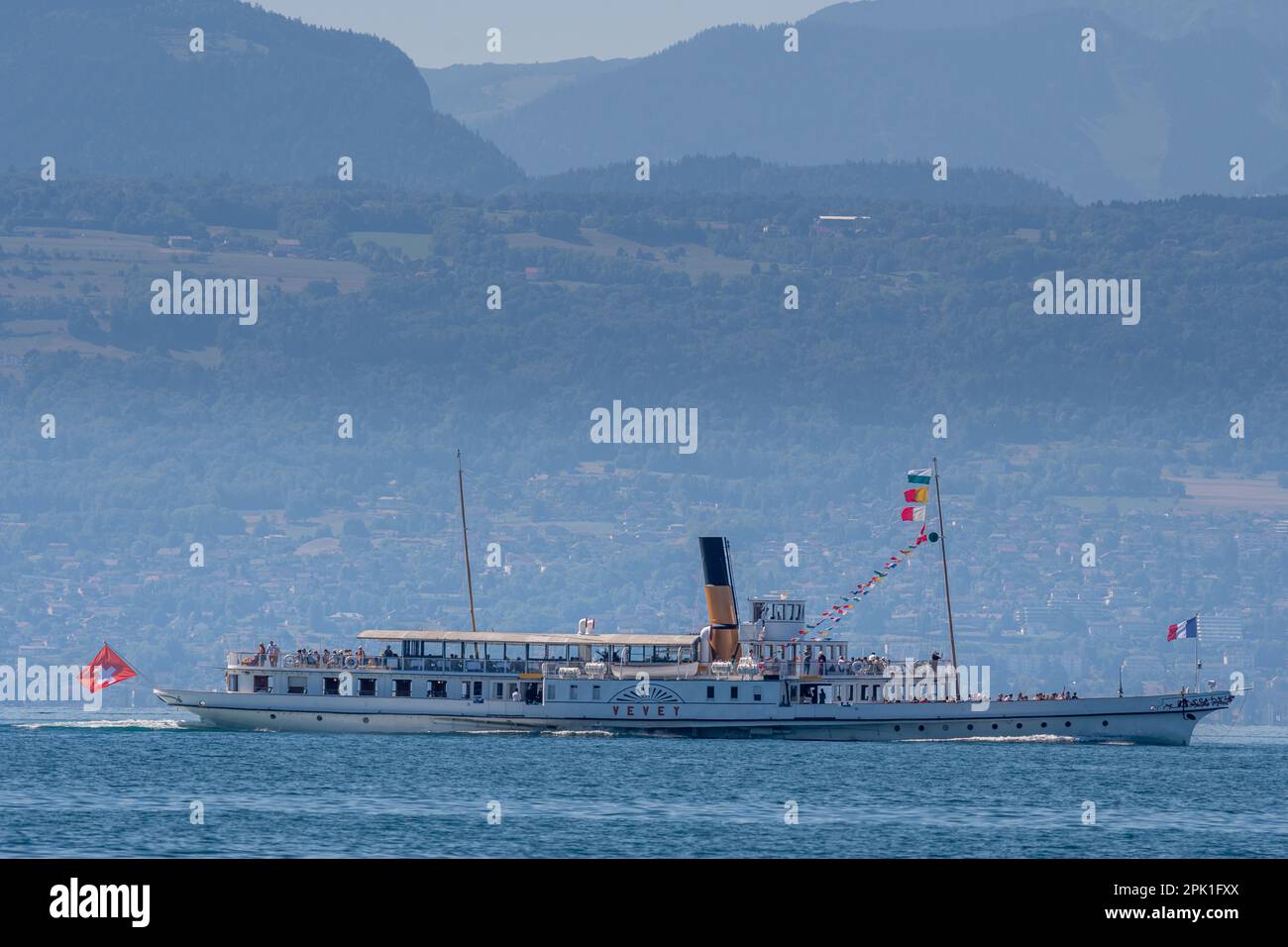 Boat on water. Swiss steamboat with passengers on Lake Geneva. CGN boat