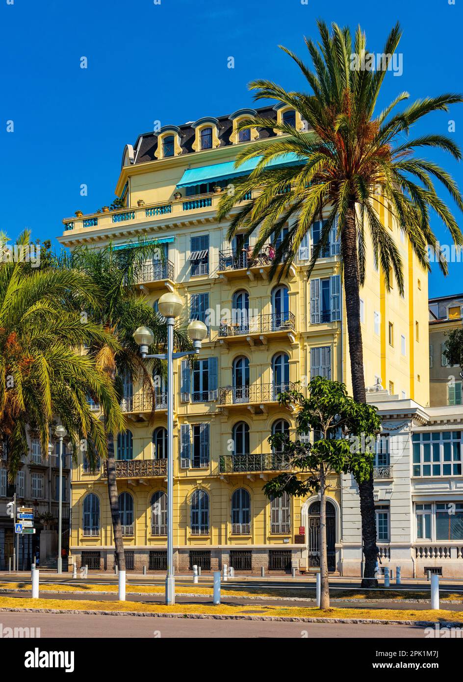 Nice, France - August 5, 2022: Hotel des Anglais city hall residence at Quai des Etats Unis avenue and Prom des Anglais boulevard along Nice beach Stock Photo