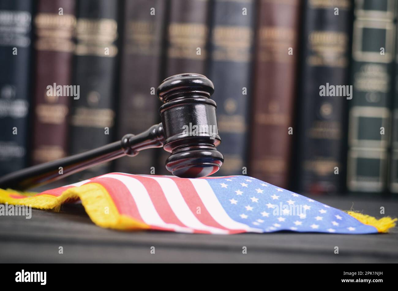 Law and Justice, Legality concept, Law library, Judge Gavel and United States of America flag on a black wooden background. Stock Photo