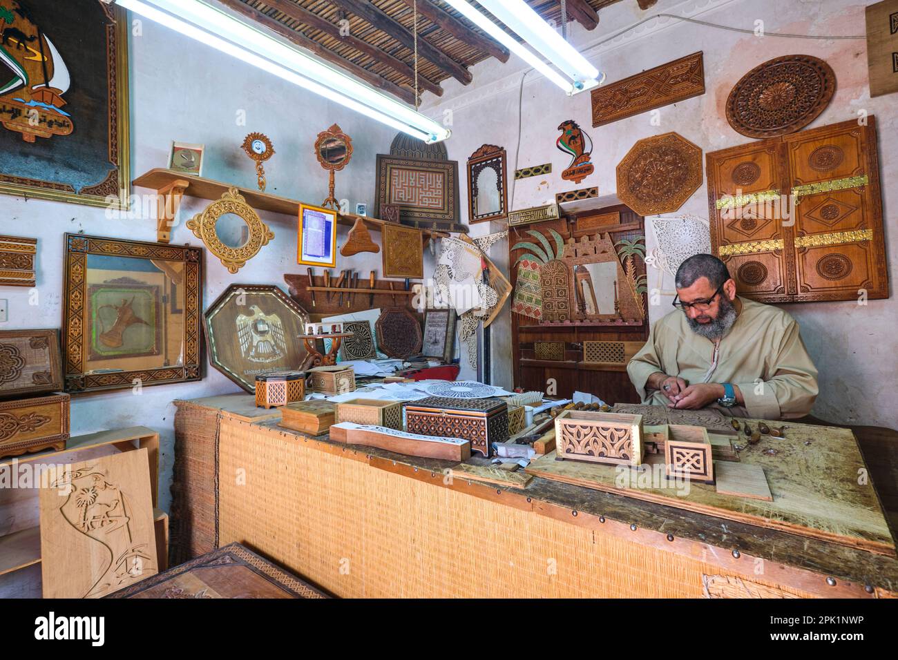 One of the craftsmen working at a shop in the complex. He is wood