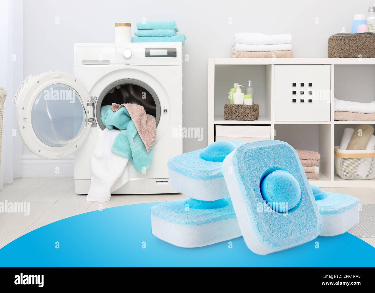 Image of water softener tablets and modern washing machine in laundry