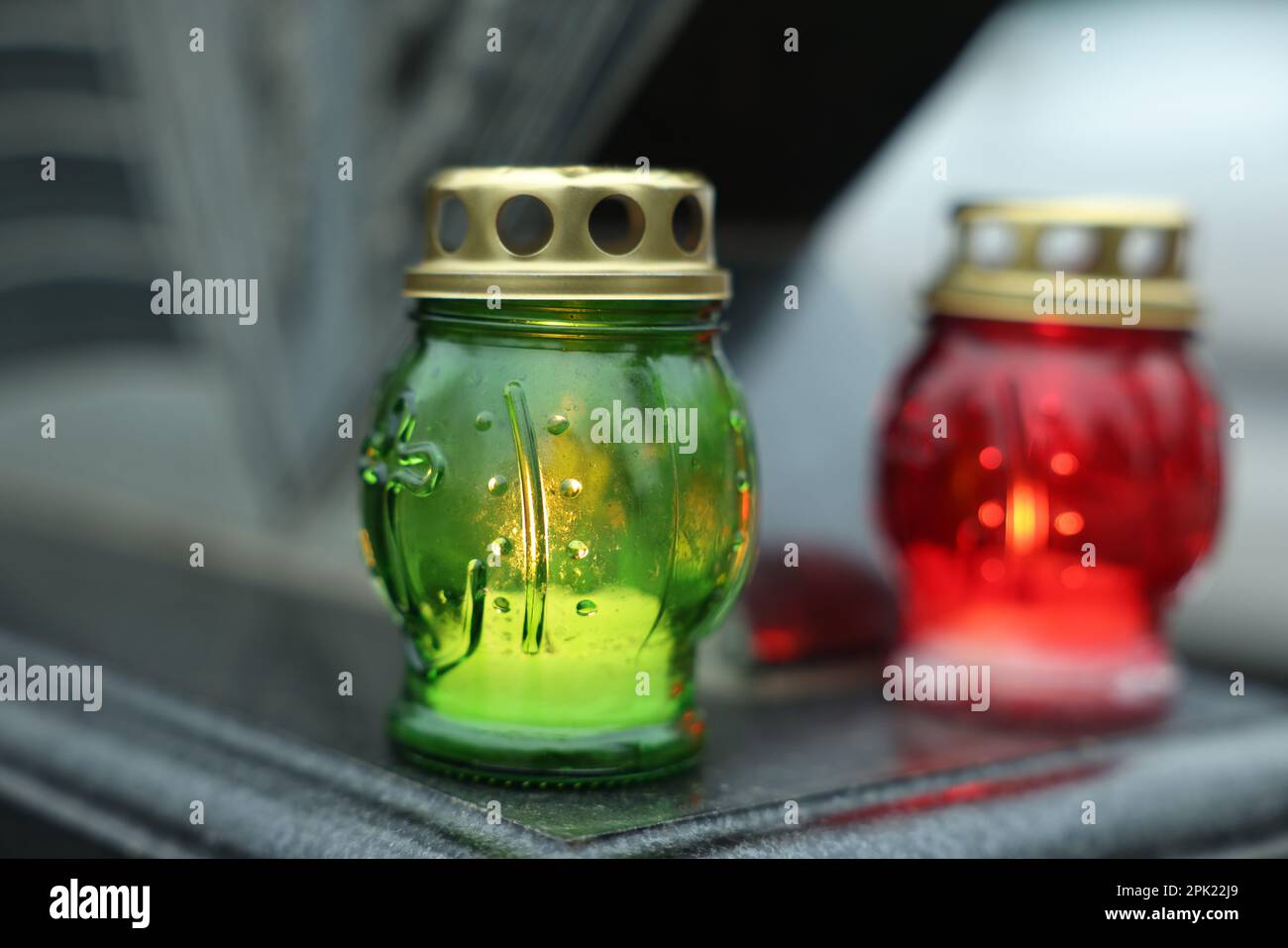 Grave lights on granite tombstone at cemetery, closeup Stock Photo Alamy