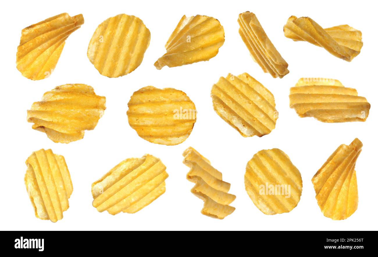 Set of ridged crispy potato chips on white background Stock Photo Alamy