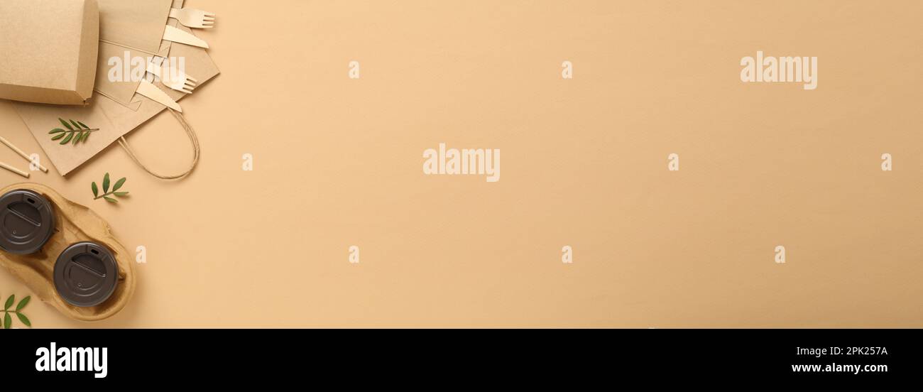 Eco friendly products on beige background, flat lay with space for text ...