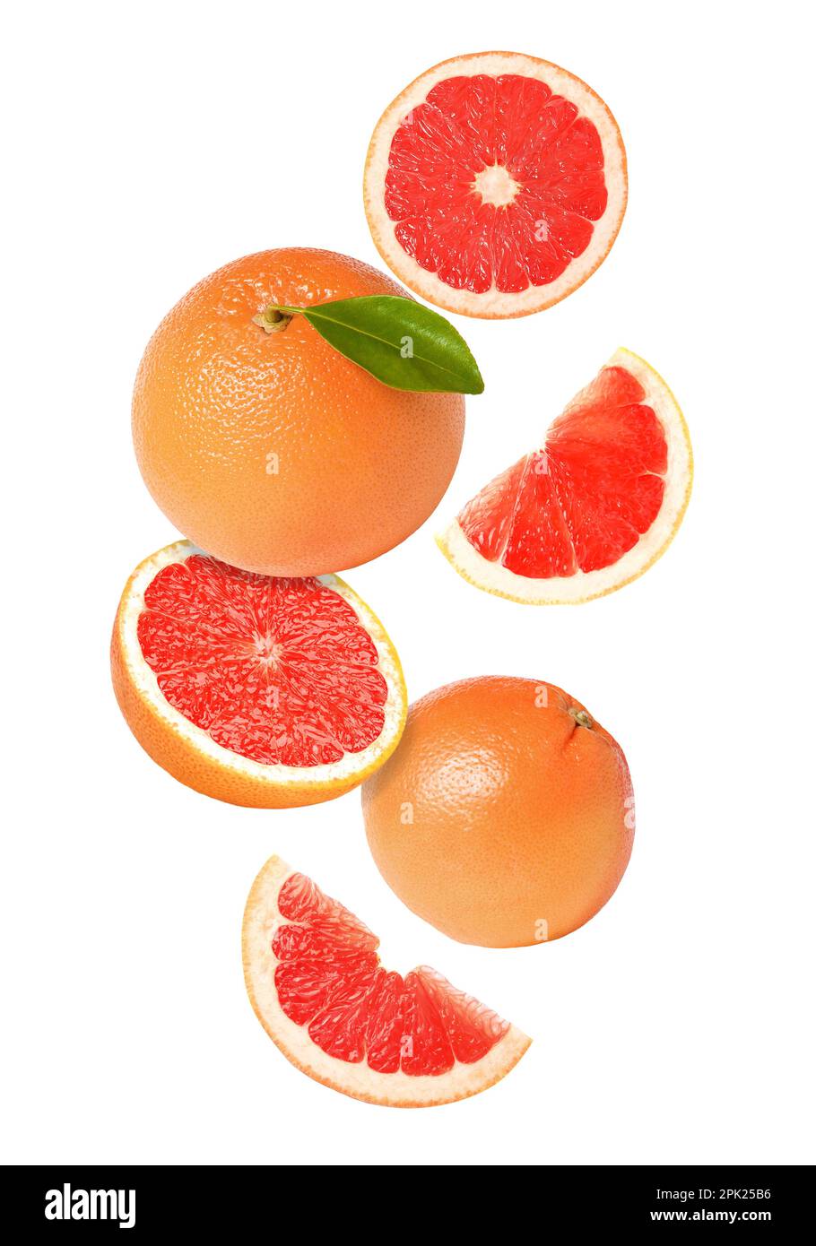 Tasty ripe grapefruits falling on white background Stock Photo