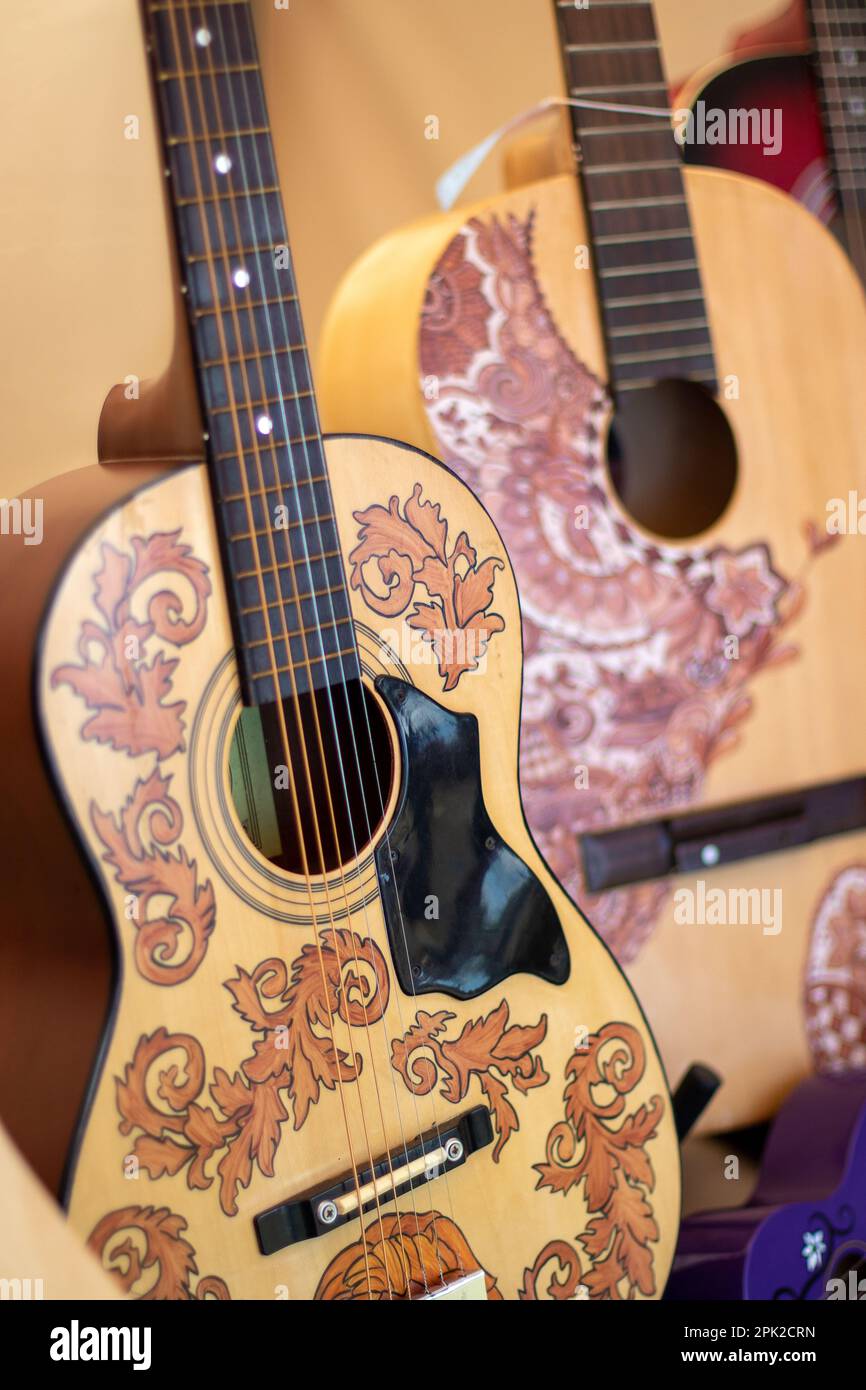 Fancy floral decoration on the soundboard of acoustic guitars for sale
