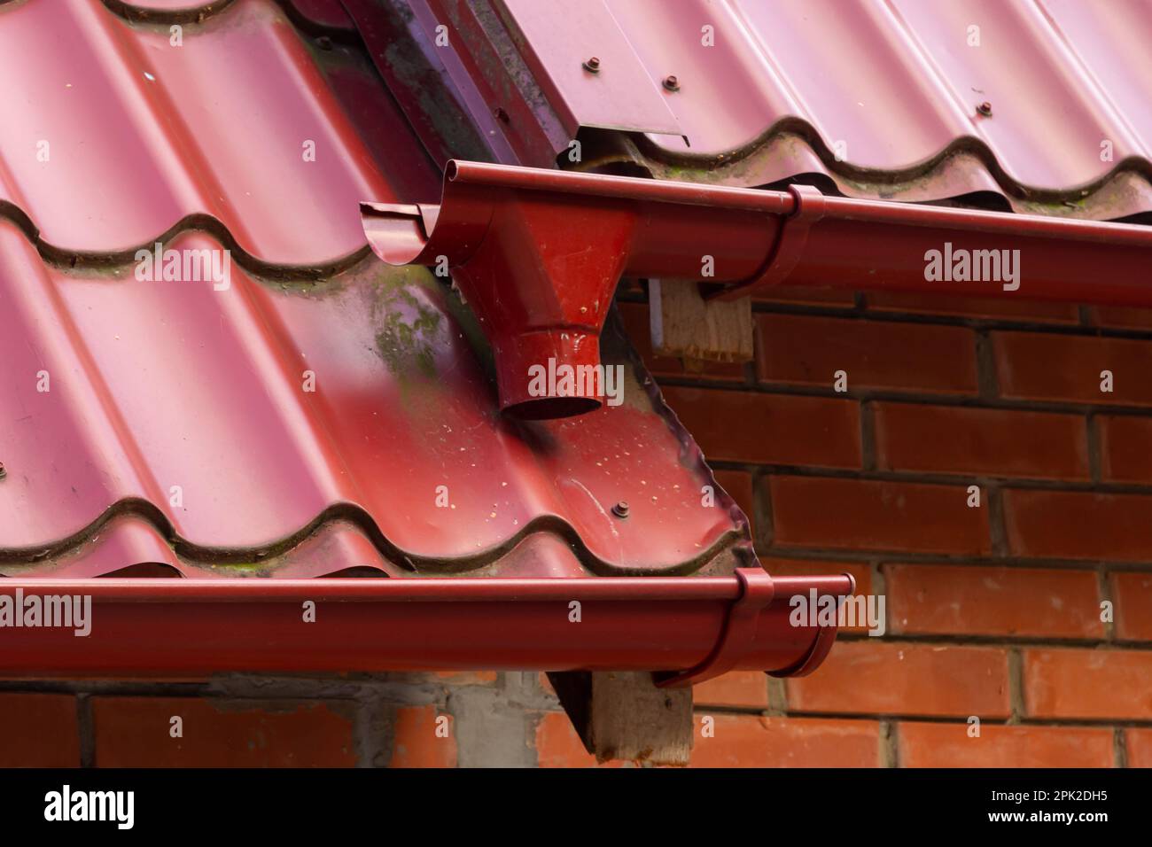 Holder gutter drainage system on the roof. Drain on the roof of the
