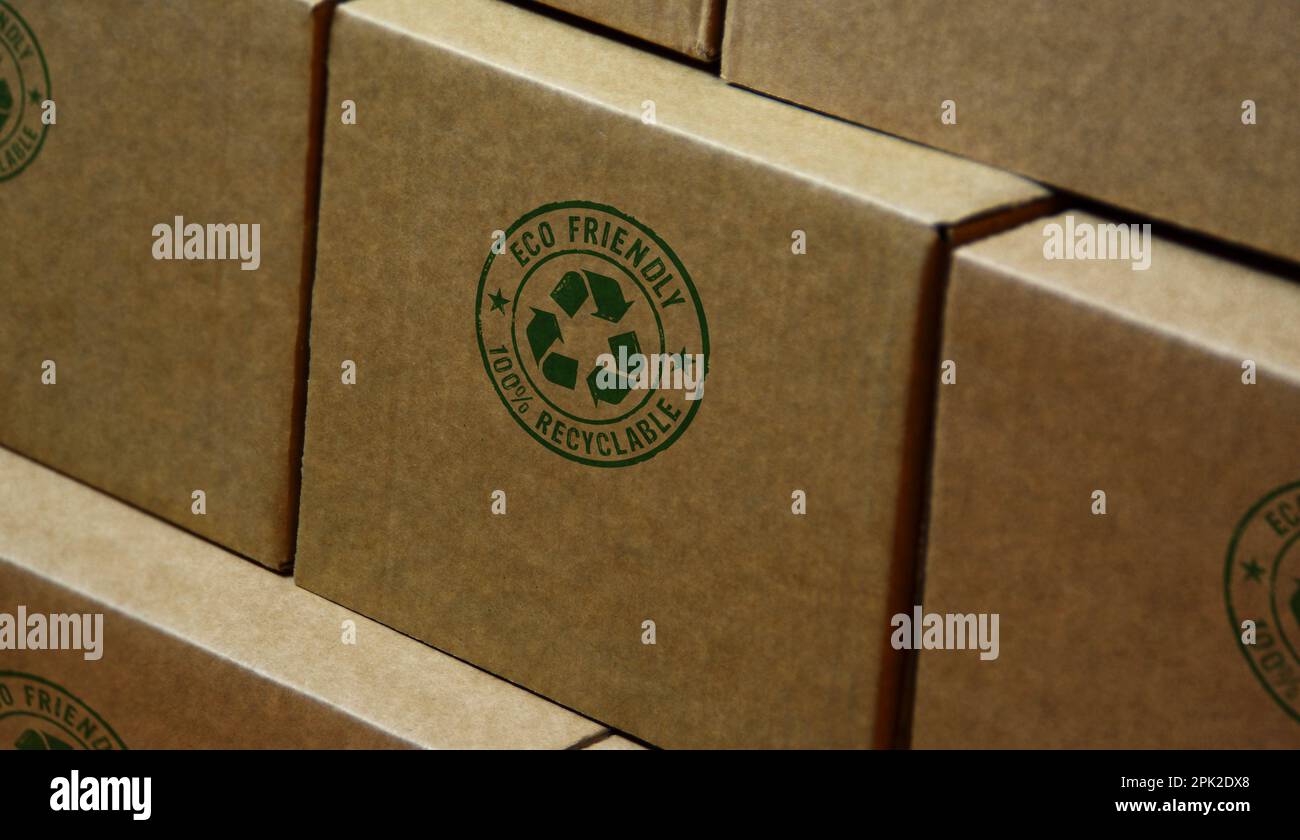 Eco friendly recycling stamp printed on cardboard box. Environment ecology and sustainable business concept. Stock Photo