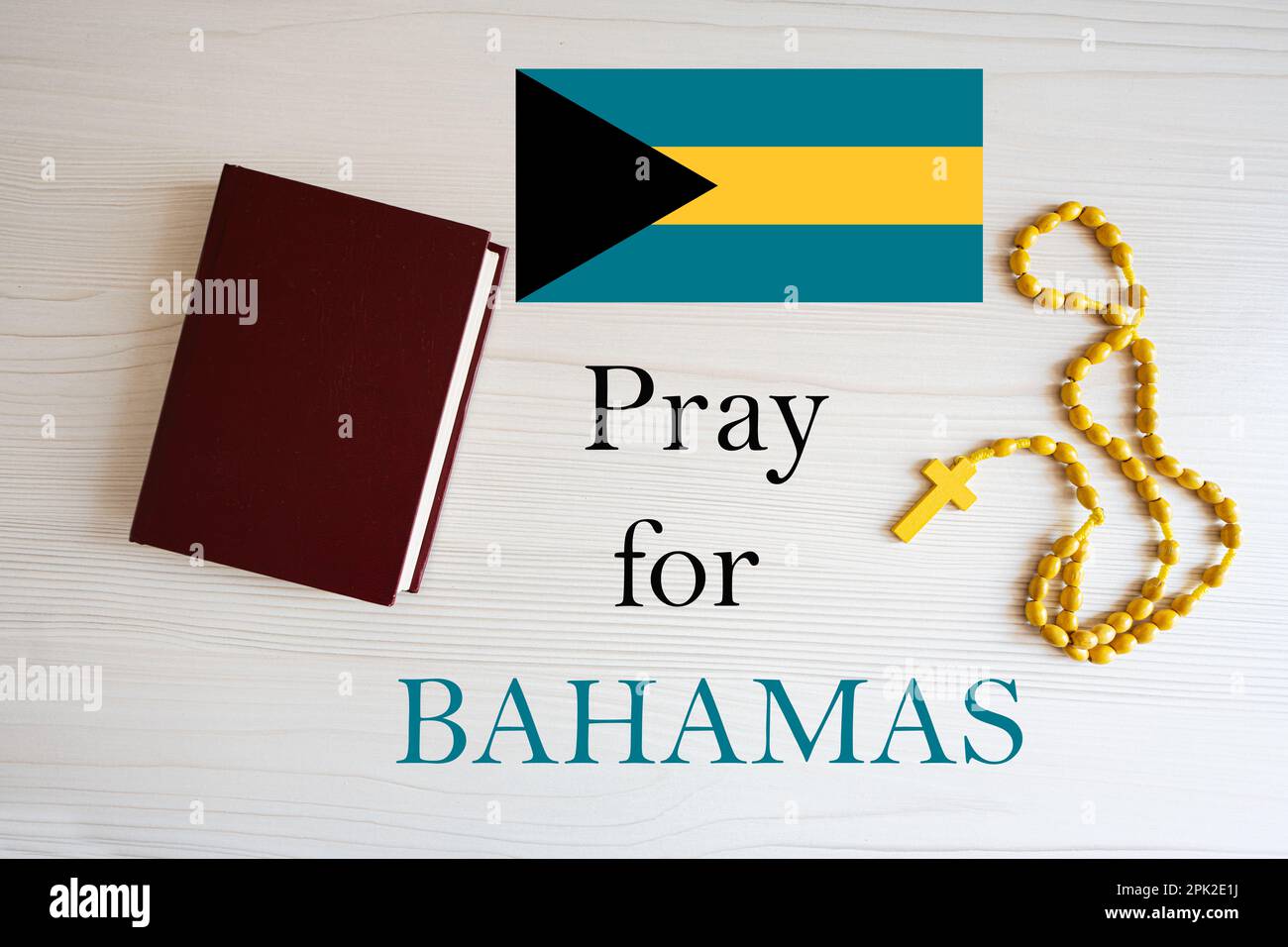 Pray for Bahamas. Rosary and Holy Bible background. Stock Photo