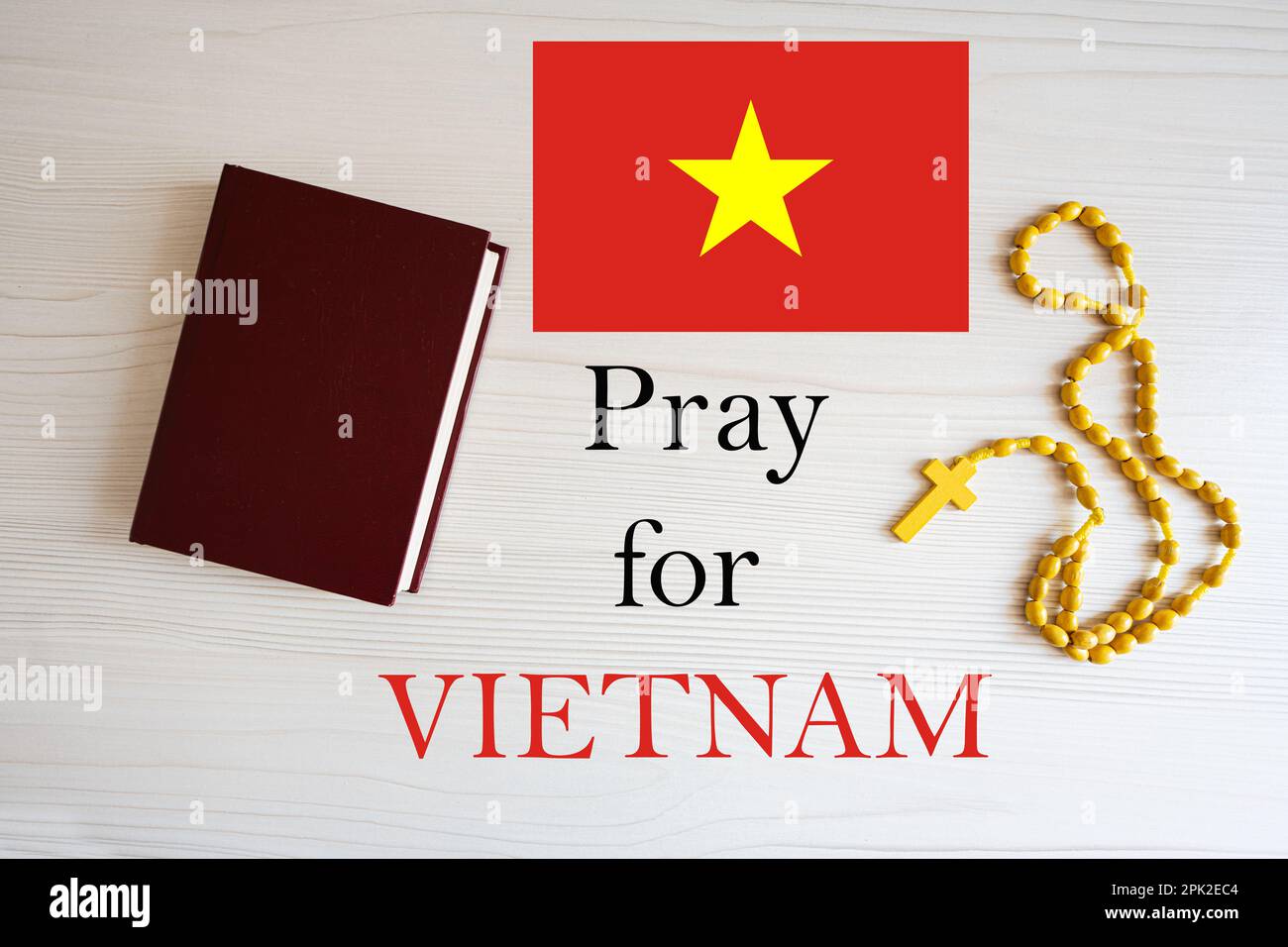 Pray for Vietnam. Rosary and Holy Bible background. Stock Photo
