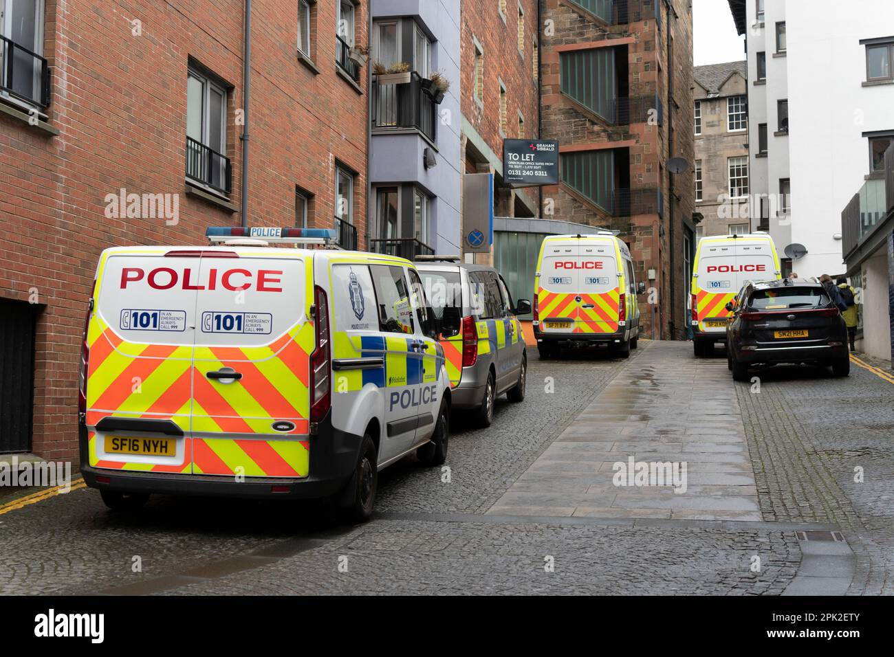 Edinburgh, Scotland, UK. 5 April 2023. Police enter office building