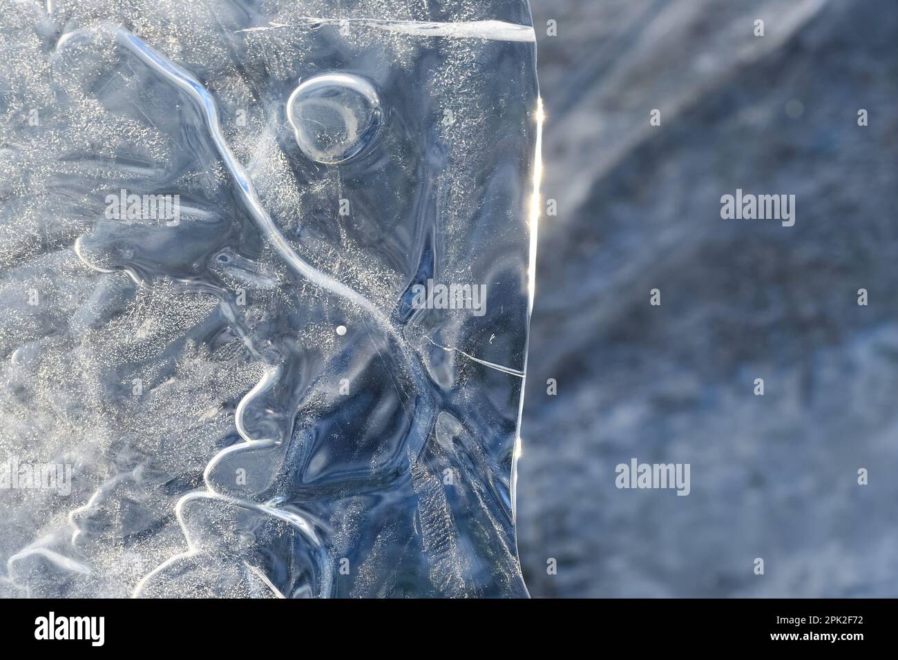 the mask... Ice sculptures ( Winter flood Lower Rhine 2020/2021 ), art in nature, ice plate randomly formed by wind and weather Stock Photo