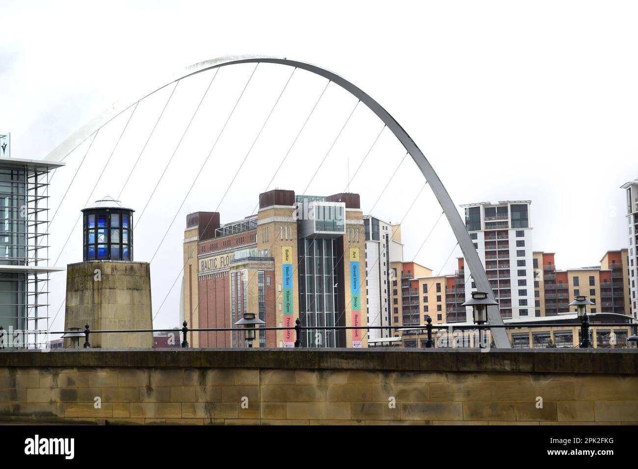 Gateshead, Tyne and Wear, England, UK. Baltic Centre for Contemporary Art seen from the Gateshead Millennium Bridge of the river Tyne Stock Photo