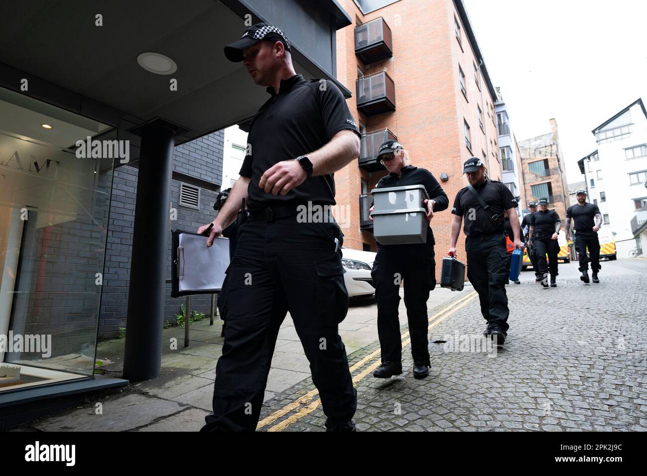Edinburgh, Scotland, UK. 5 April 2023. Police enter office building
