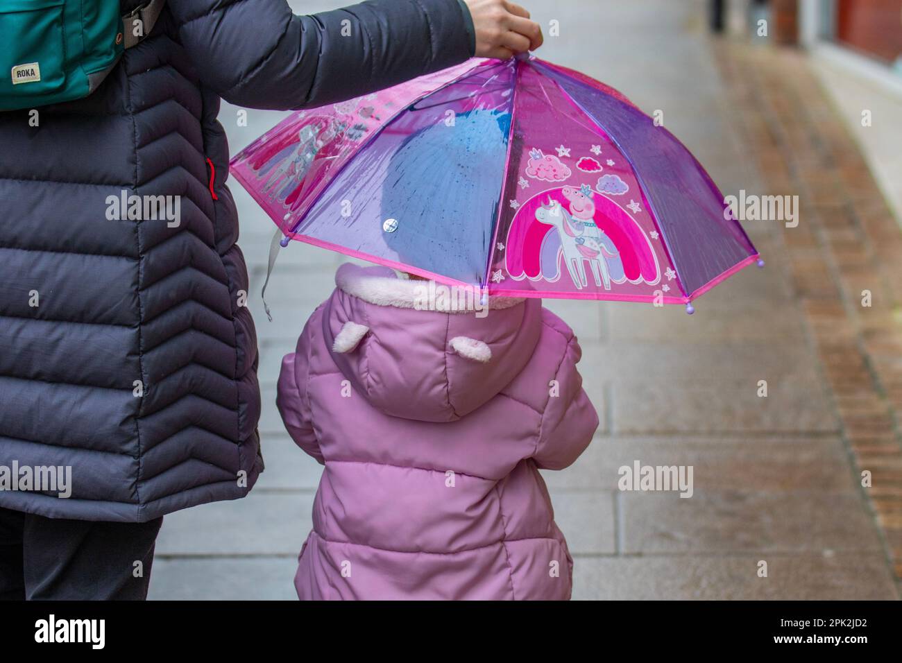 PRESTON, Lancashire.  Uk Weather.  Shops, shoppers, and people shopping on a rainy day in the city centre.  Outbreaks of rain pushing eastwards but gradually clearing from the northwest. Credit MediaWorldImages/AlamyLiveNews Stock Photo