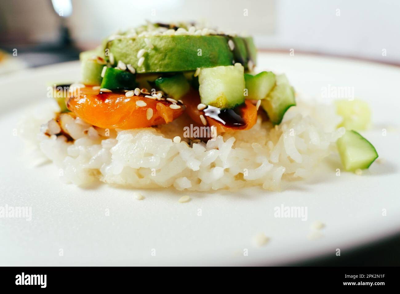 Sushi Waffle is crispy rice, made in a waffle maker, topped with shoyu