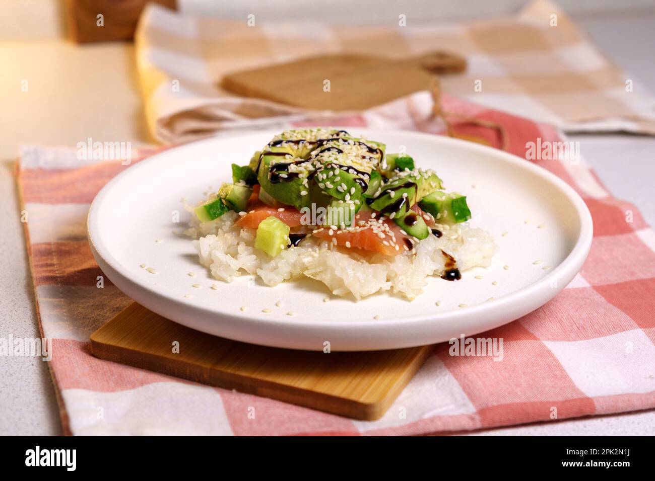 Sushi Waffle is crispy rice, made in a waffle maker, topped with shoyu