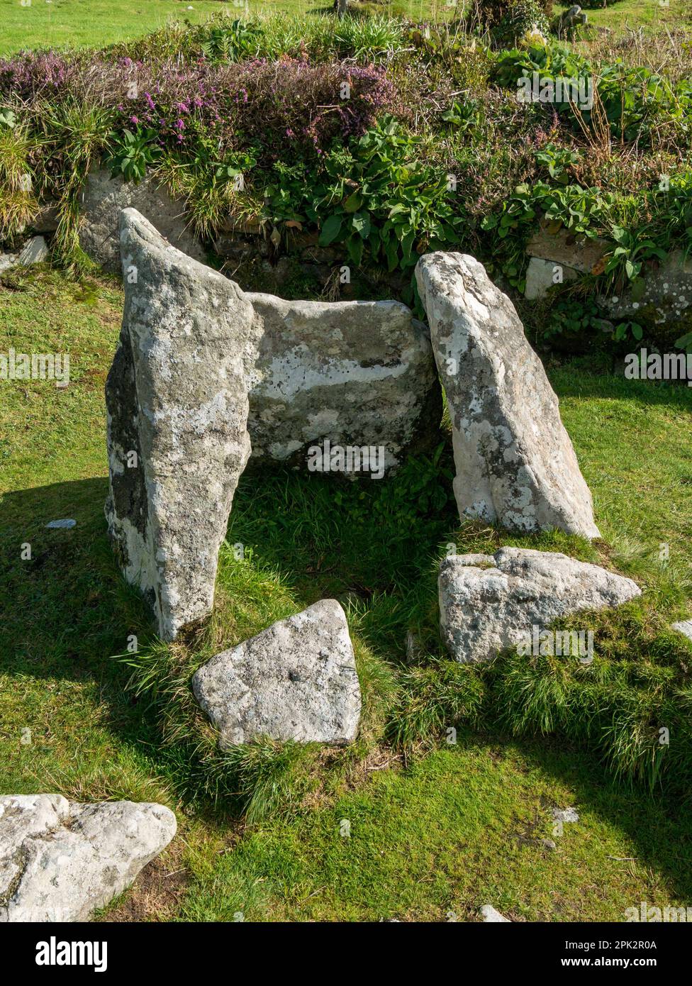Stone fireplace hearth inside remains of Courtyard house, Chysauster Ancient Village, Cornwall, England, UK Stock Photo