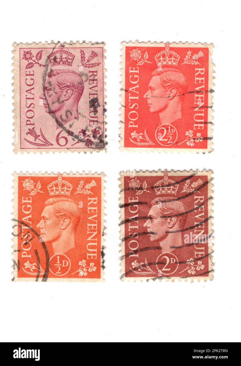 Vintage King VI postage stamps from the United Kingdom isolated