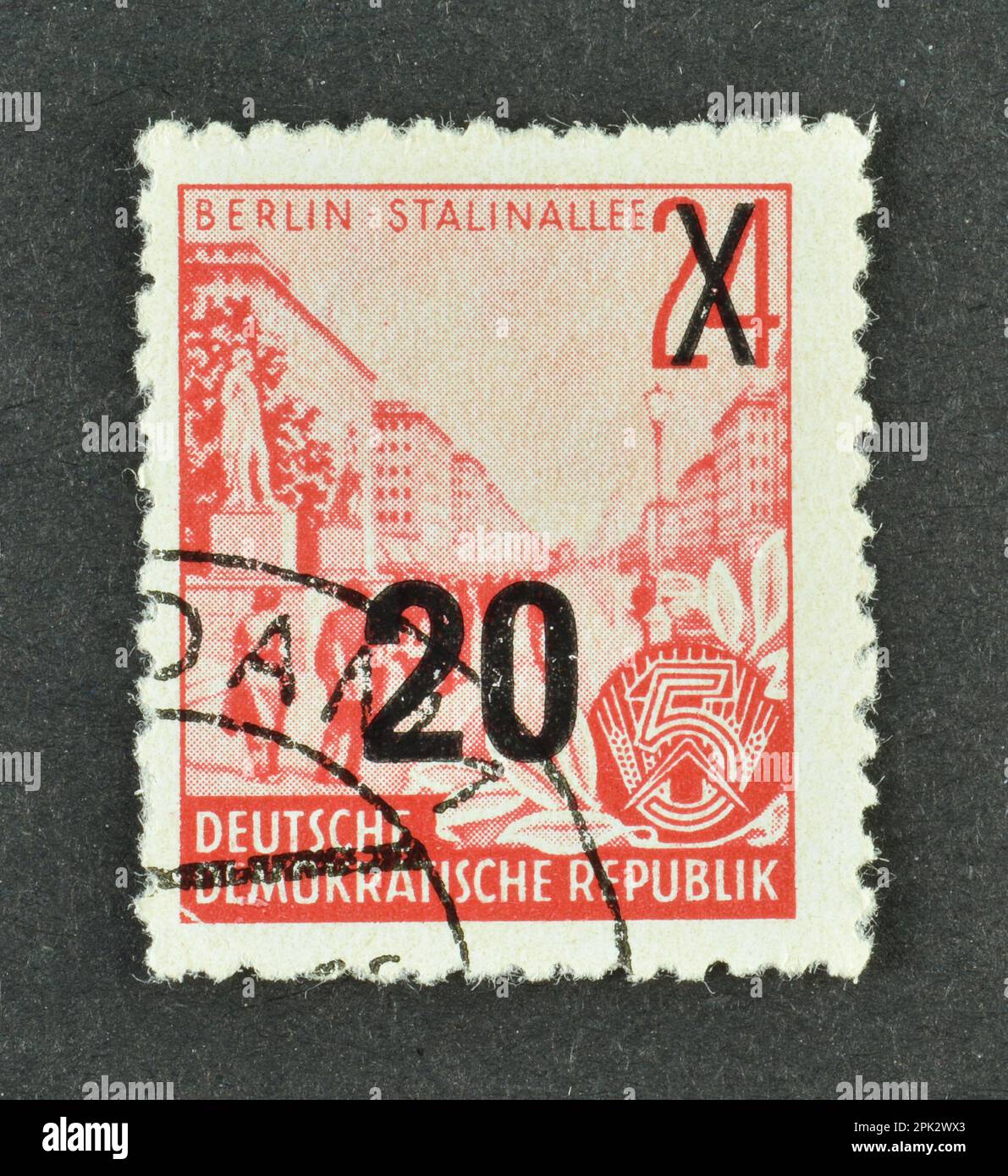 Cancelled postage stamp printed by East Germany, that shows Stalin Avenue, Berlin - Surcharged, circa 1955. Stock Photo