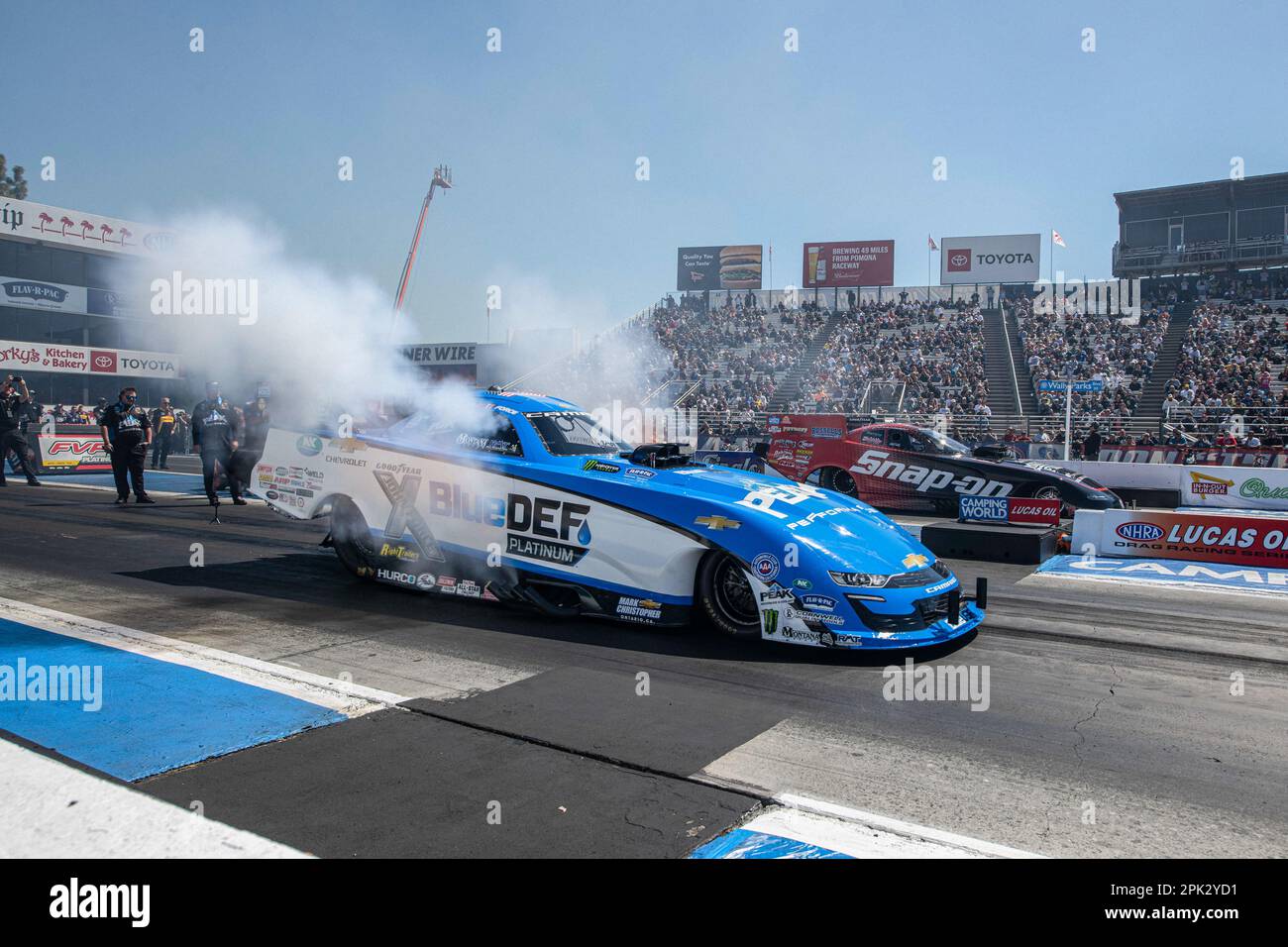 Pomona, United States. 02nd Apr, 2023. John Force lines up next to his