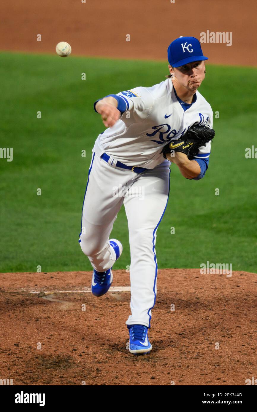 Kansas City Royals starting pitcher Brady Singer throws during the