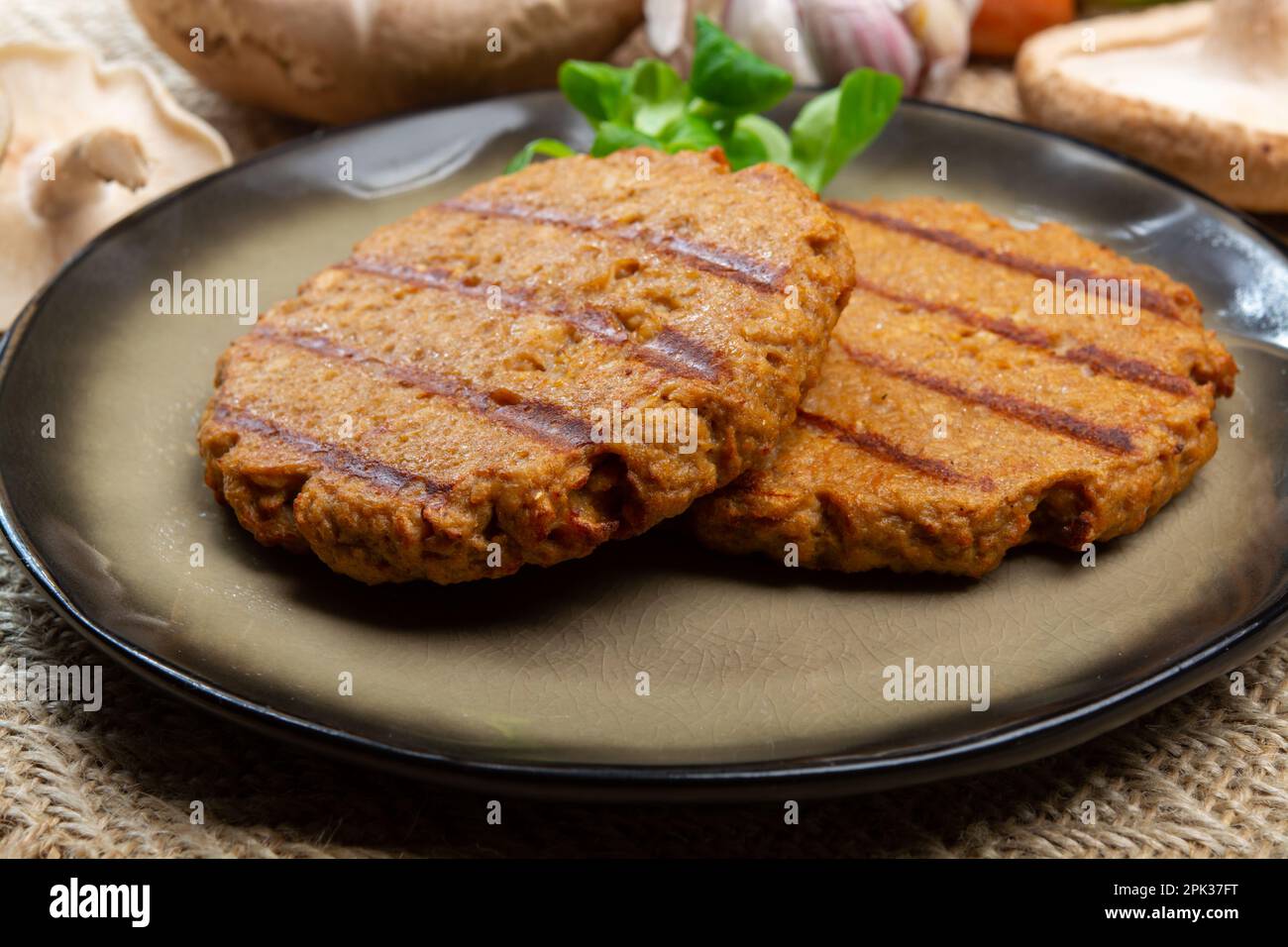 Tasty vegetarian burgers made from healthy quinoa, basil, portobello