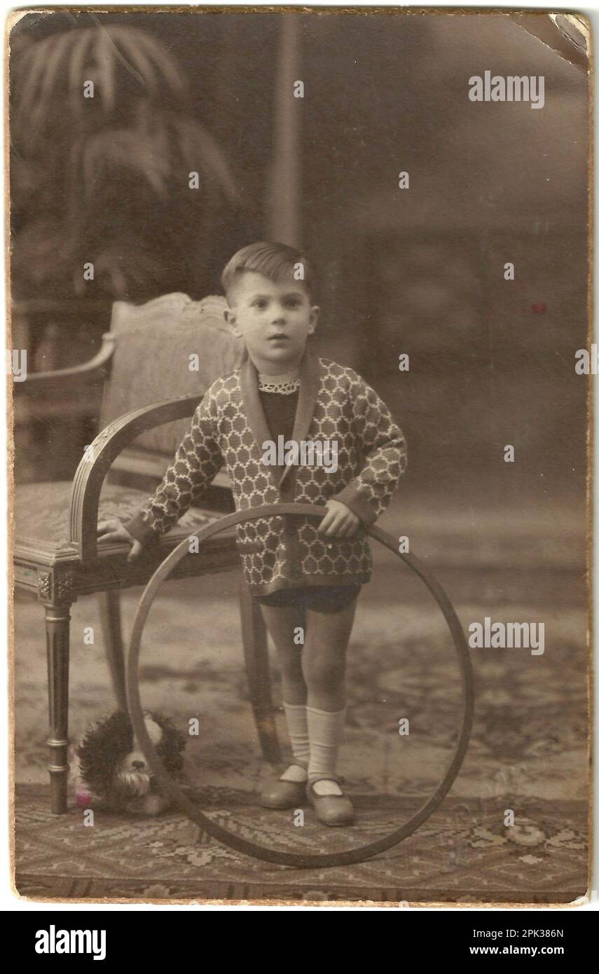 Boy with Hoop, Barcelona, early 1900s Stock Photo