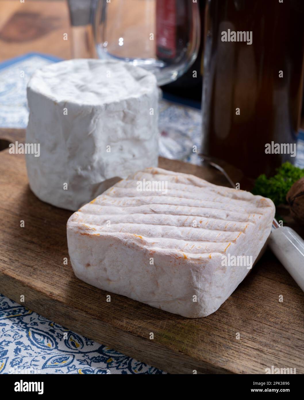 Cheese collection, Belgian soft yellow cow milk cheese with white mold ...