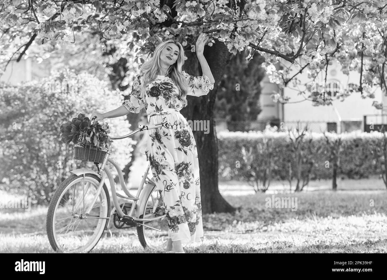 Spring dress woman biking hi-res stock photography and images - Alamy