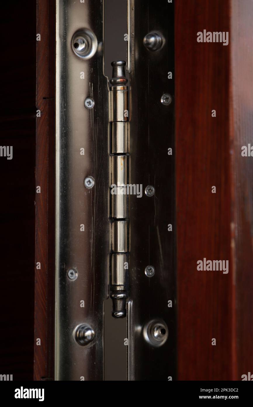 metal hinge for wooden safety door Stock Photo Alamy