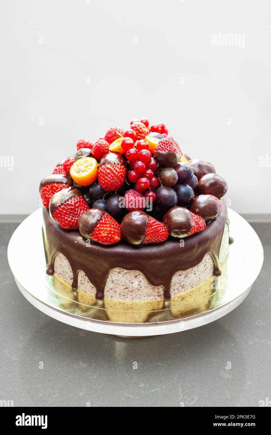 Cake with strawberry and candles hi-res stock photography and images ...