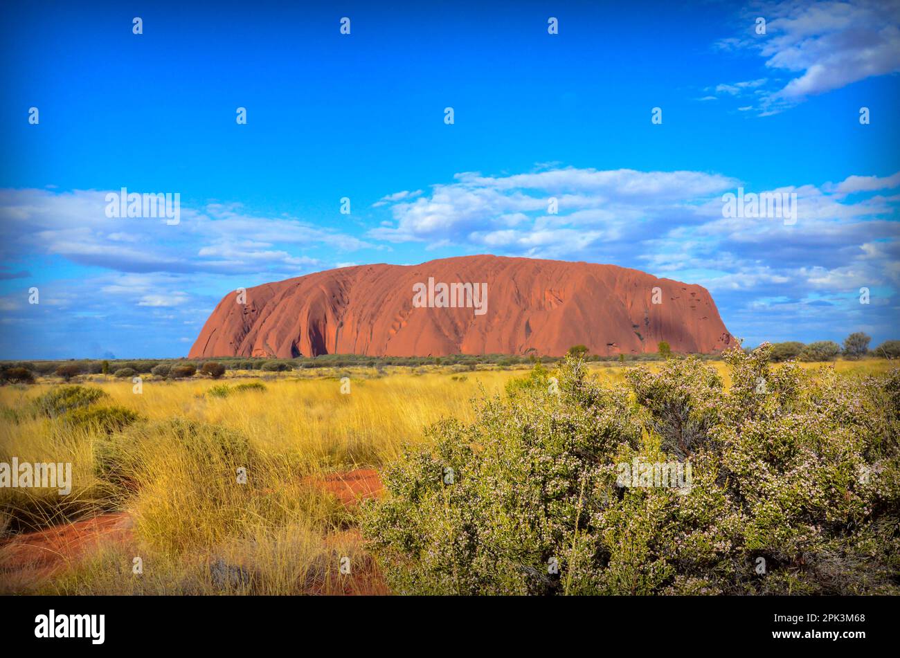 Uluru Ayers Rock Is A Giant Monolith Of Red Sandstone Located In The 
