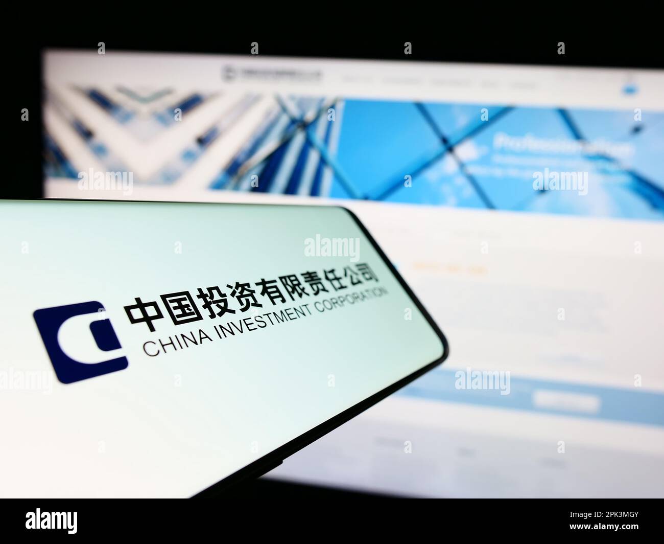 Cellphone with logo of China Investment Corporation (CIC) on screen in
