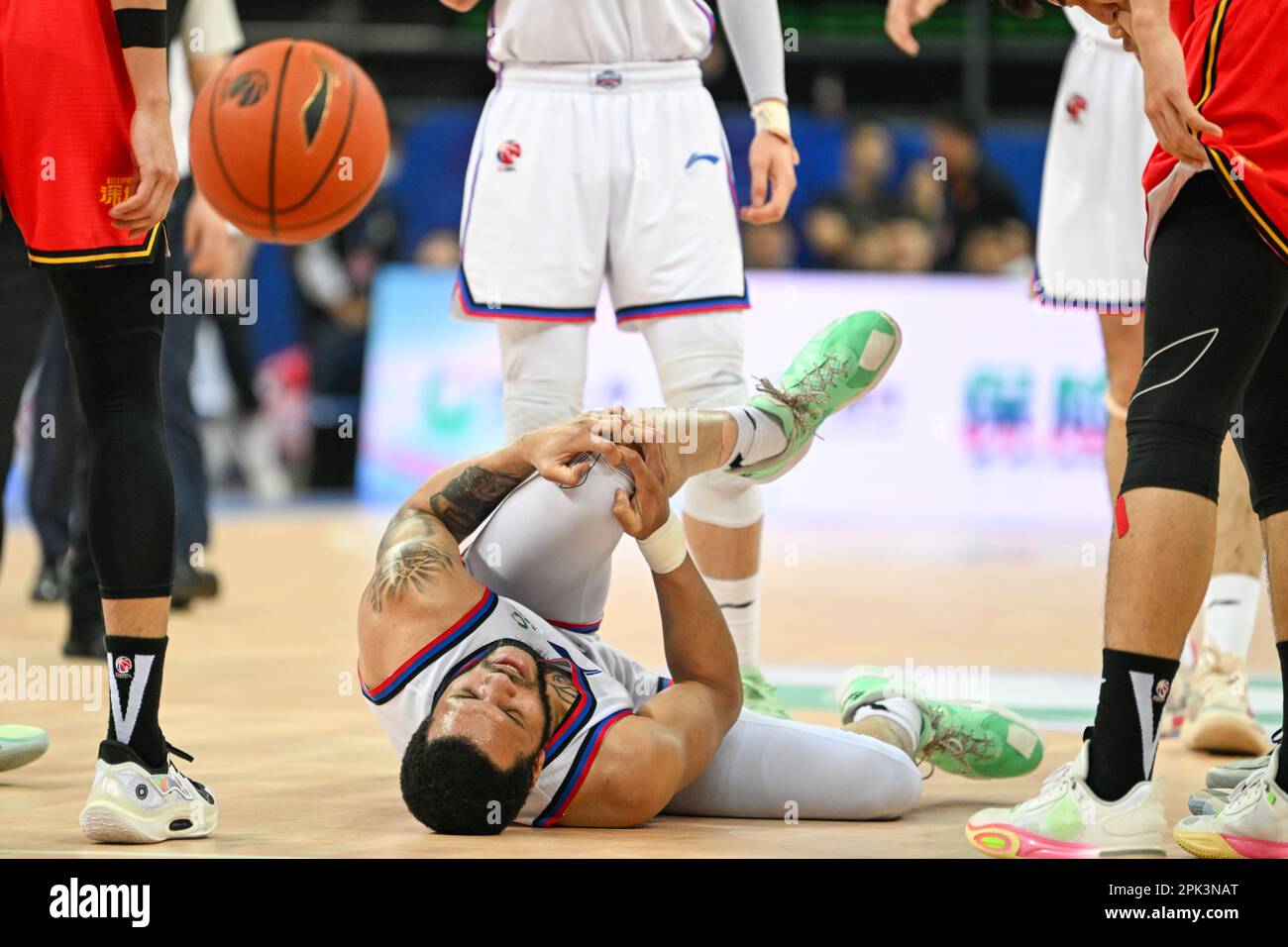 Tianjin. 5th Apr, 2023. Quinndary Weatherspoon of Tianjin Pioneers reacts after getting injured during the 42nd round match between Tianjin Pioneers and Shenzhen Leopards at 2022-2023 season of the Chinese Basketball Association (CBA) league in north China's Tianjin, April 5, 2023. Credit: Sun Fanyue/Xinhua/Alamy Live News Stock Photo
