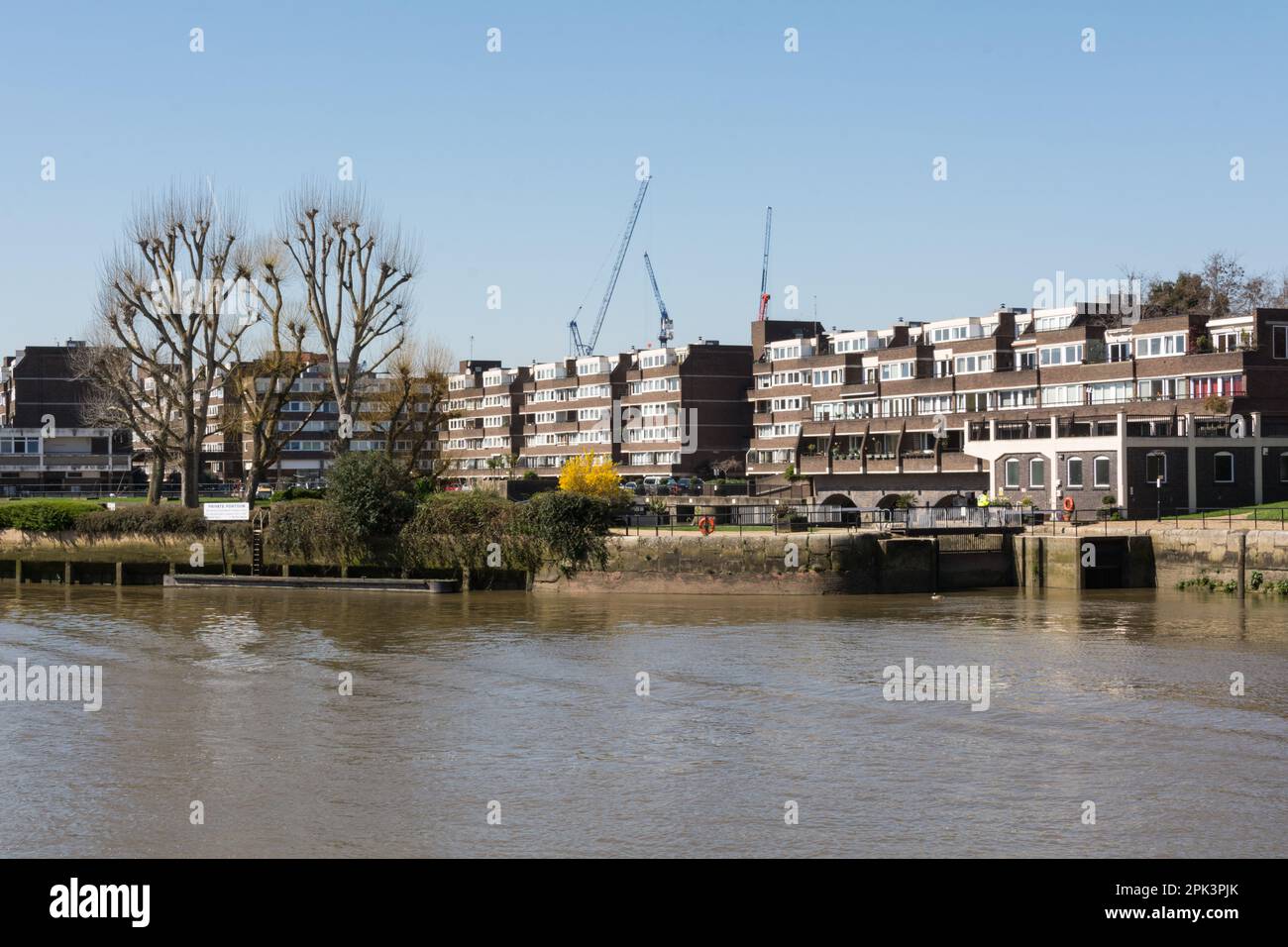 The entrance to the Brentford Dock housing development from the River Thames, Brentford, Middlesex, London, TW8, UK Stock Photo
