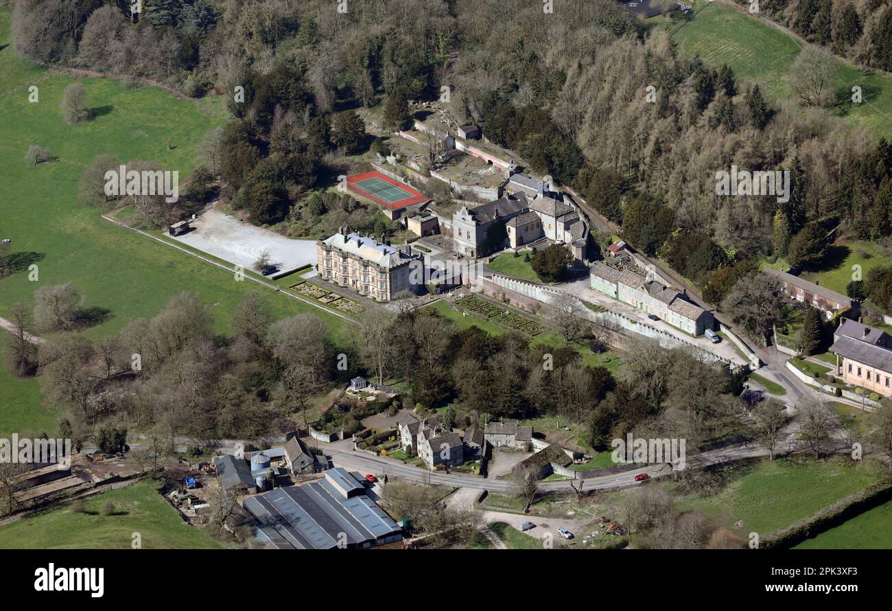 aerial view of Home Farm in the foreground and a large country house beyond in the village of Hassop near Bakewell, Derbyshire Stock Photo