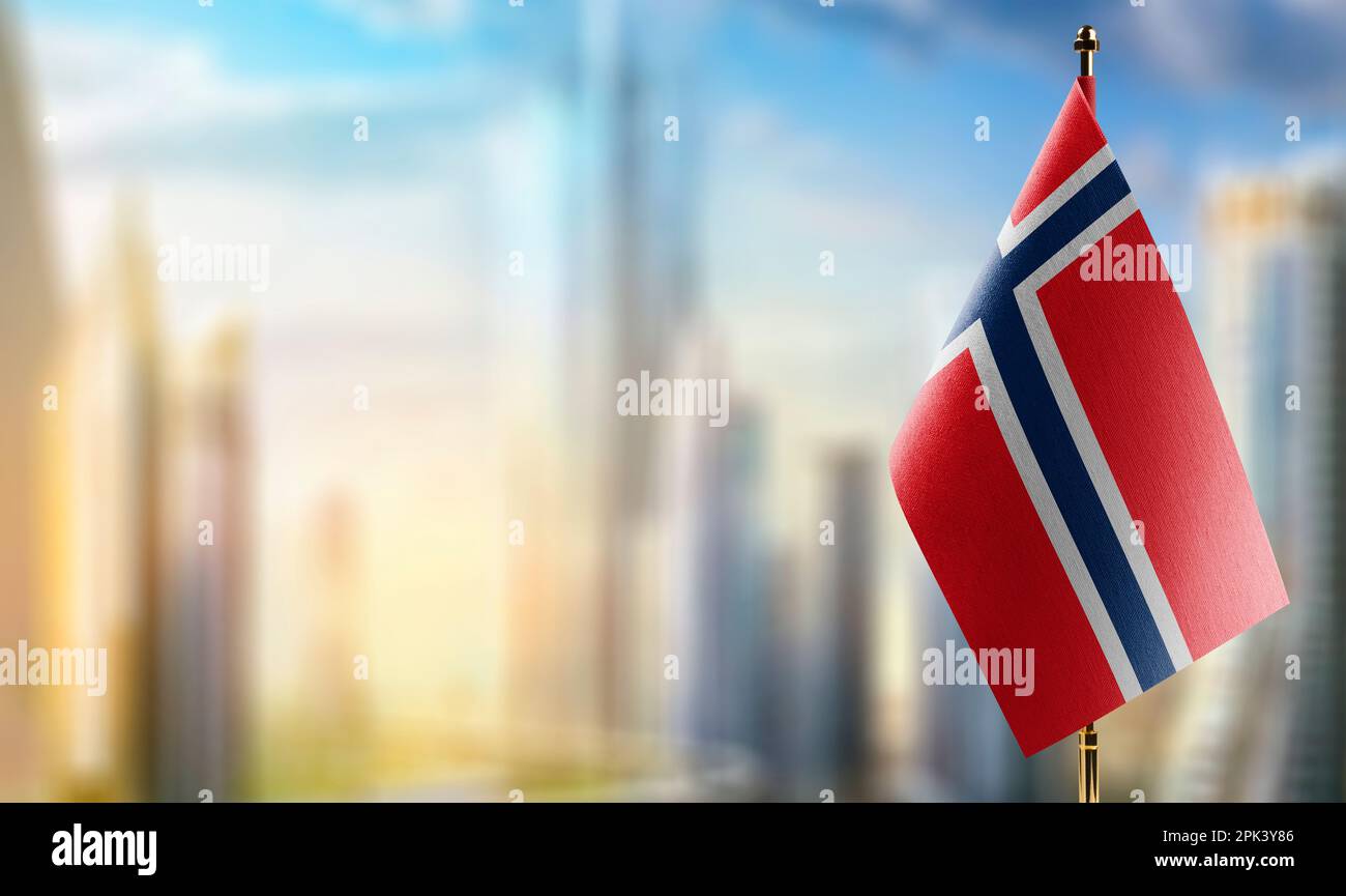 Small flags of the Norway on an abstract blurry background Stock Photo ...