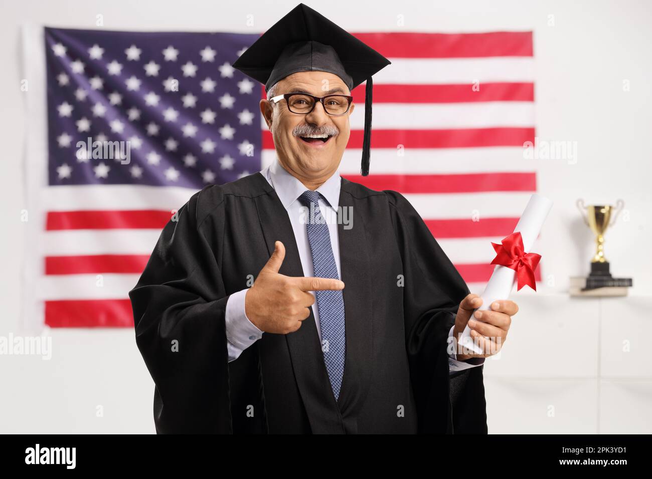 Mature man graduating in cap and gown hi-res stock photography and images - Alamy Mature man graduating in cap and gown hi-res stock photography and images - Alamy