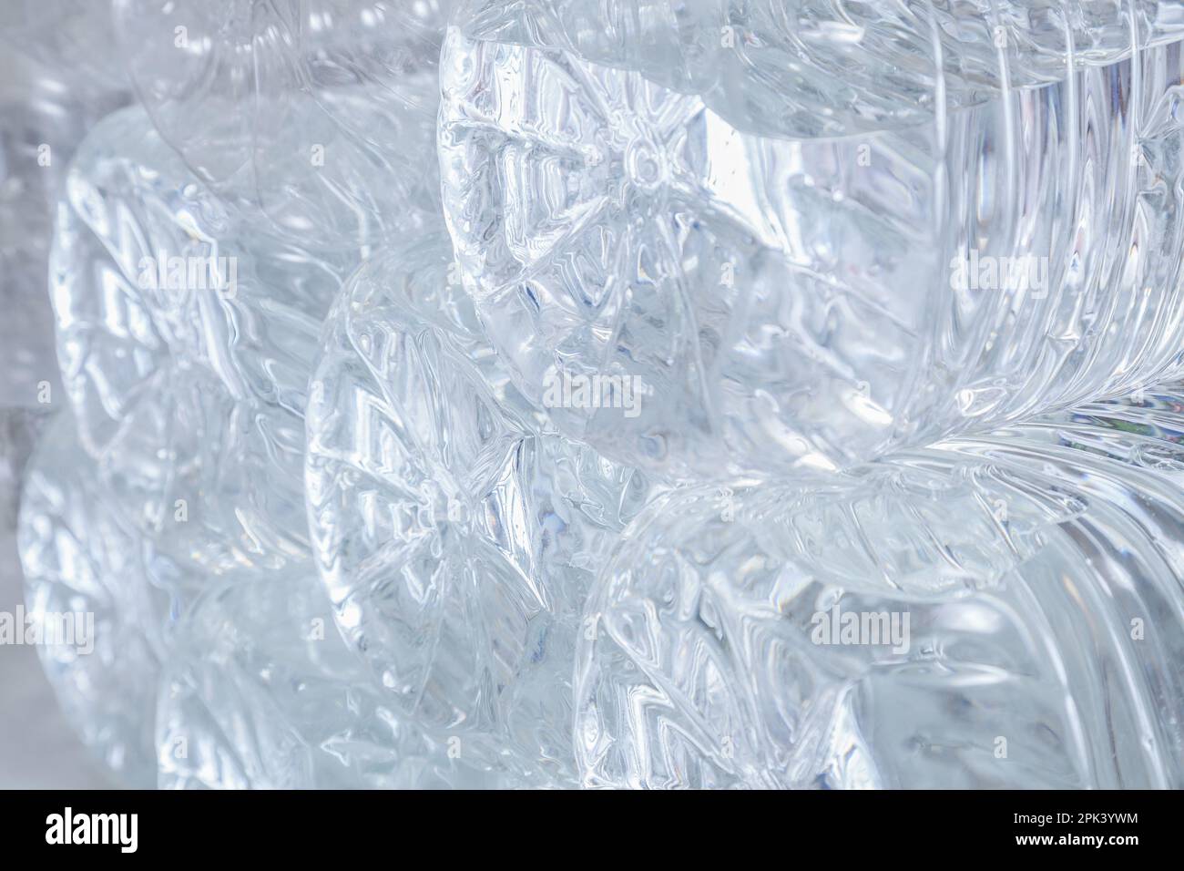 Water in plastic bottles closeup, background Stock Photo