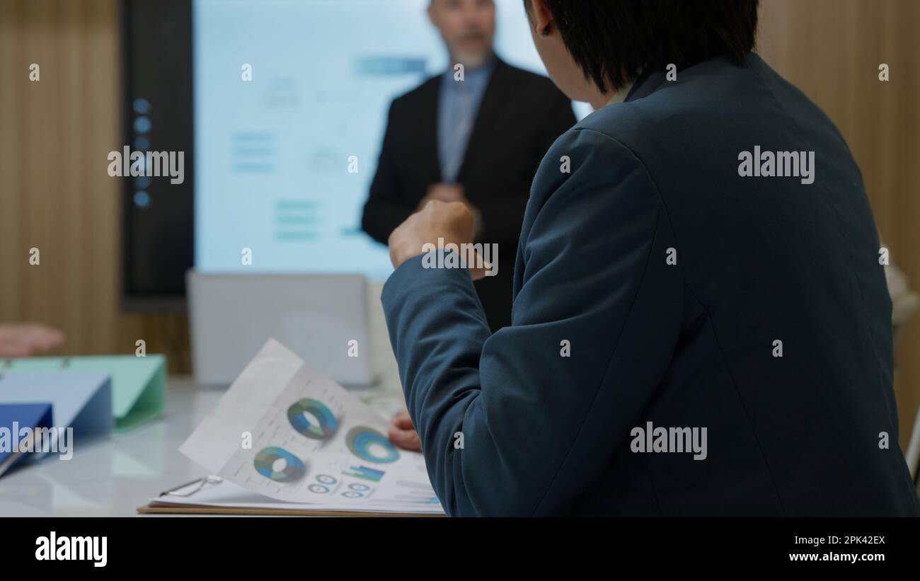 Business team meeting together talking and planing project paperwork ...