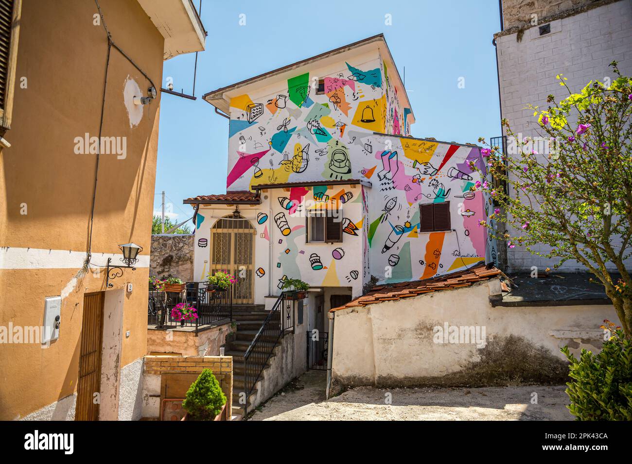 Colorful artistic house with murals in Aielli in summer. Painted houses