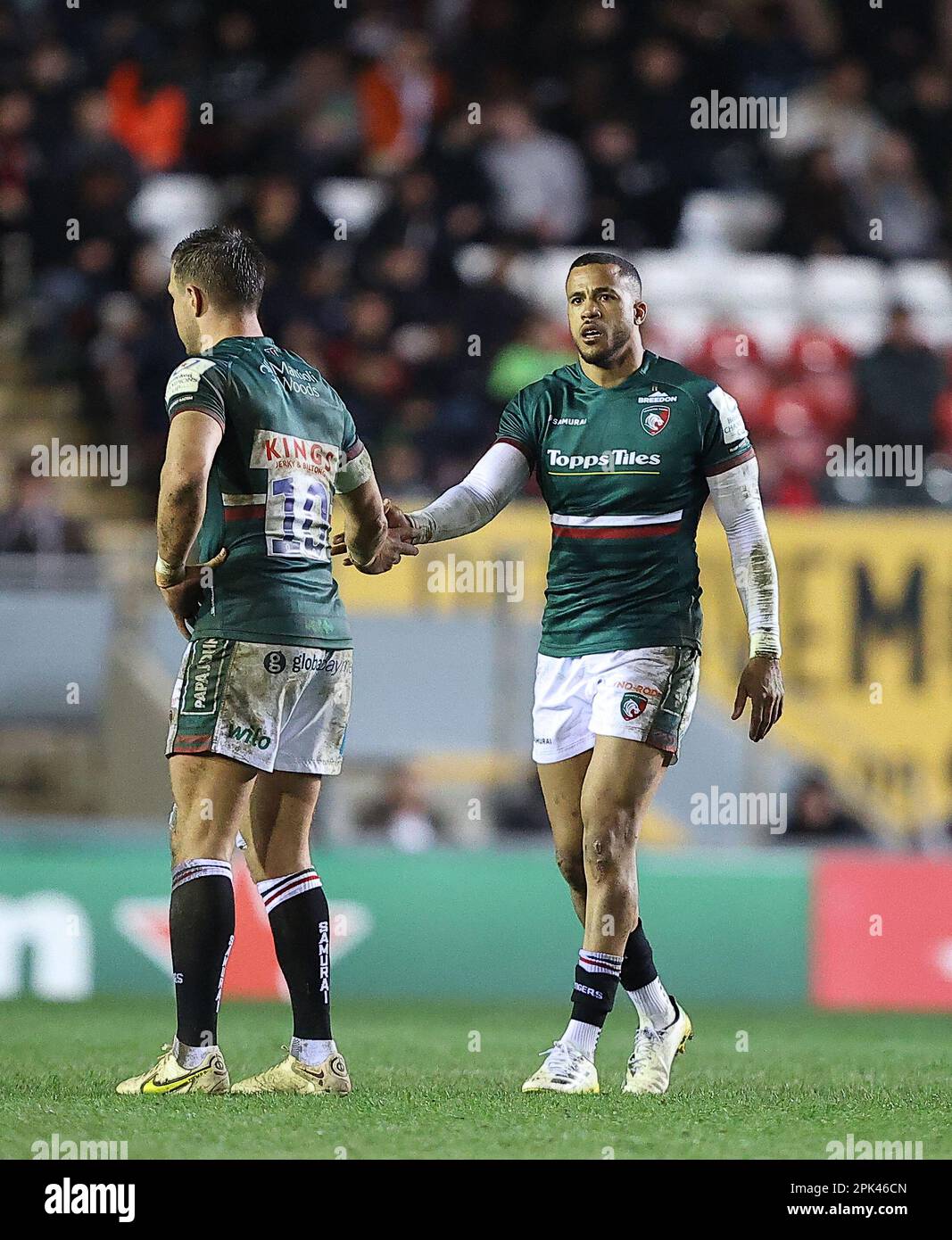 31.03.2022   Leicester, England. Rugby Union.                   Tigers Anthony Watson shakes Handr Pollard hand during the Heineken Champions Cup quarter final match played between Leicester Tigers and Edinburgh Rugby at the Mattioli Woods Welford Road Stadium, Leicester.  © Phil Hutchinson Stock Photo