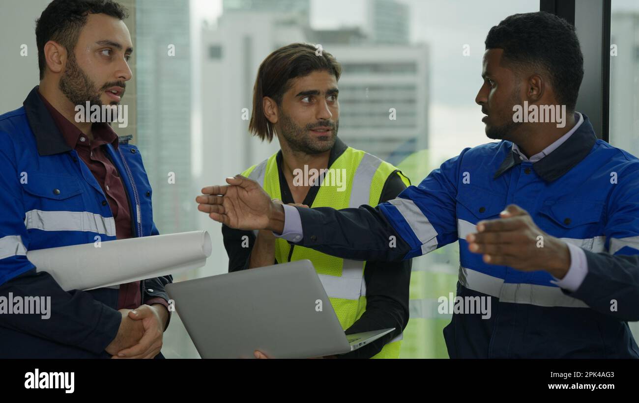 Construction engineer discussing and brainstorming with architects workers Stock Photo