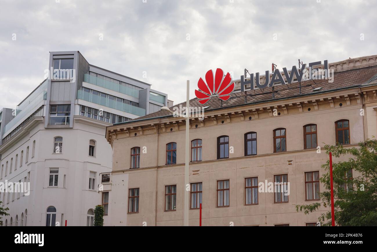 Vienna, Austria - August 7, 2022: Huawei logo on old building wall. Huawei is leading global provider of information and communications technology inf Stock Photo