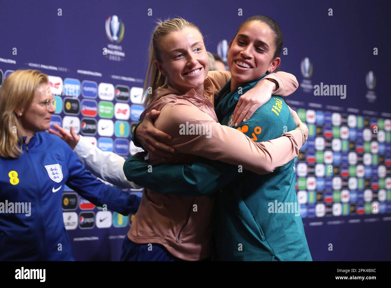 England's Leah Williamson (left) and Brazil's Rafaelle Souza hug after a joint press conference held at Wembley Stadium. Women’s EURO winners England face South American Champions Brazil in the first-ever Women’s Finalissima, which takes place tomorrow evening. Picture date: Wednesday April 5, 2023. Stock Photo